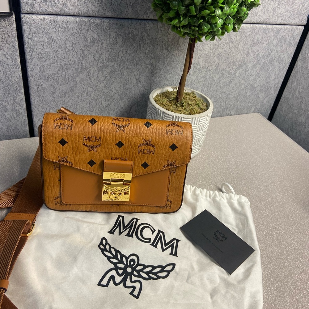 MCM Brown Crossbody Bag with Iconic Monogram and Gold Hardware